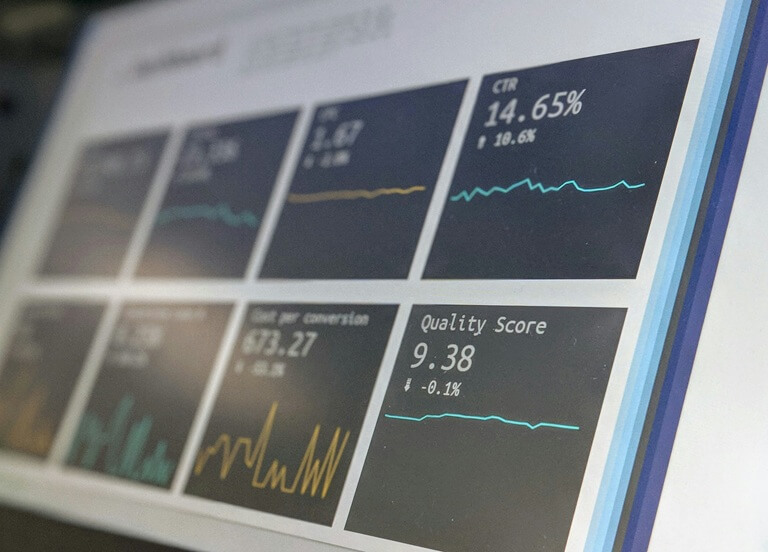 A monitoring dashboard displayed on a laptop screen tracking system data