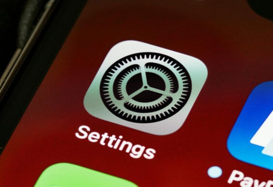 The Settings app icon on an iPhone home screen, where the eSIM and data roaming options live